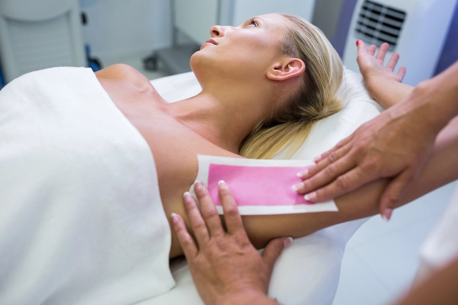 Arm waxing treatment at Bare Beauty med spa